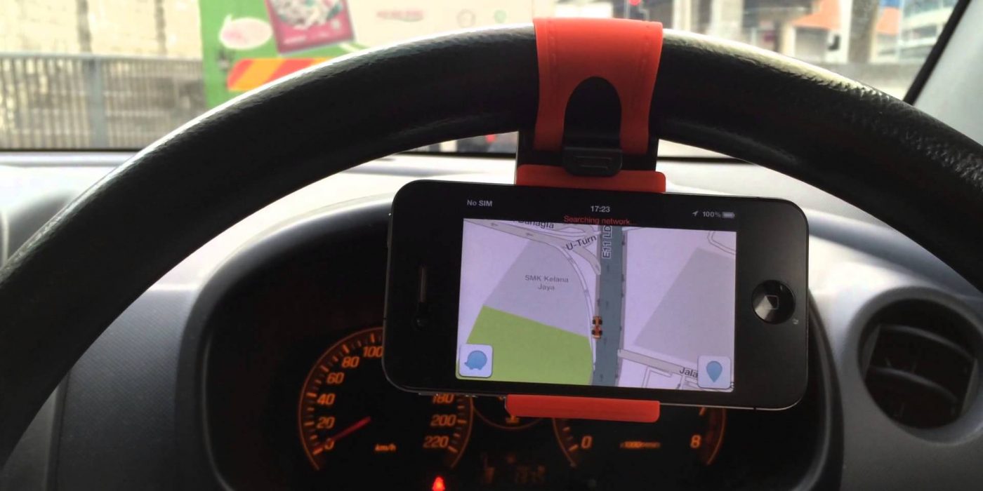 Steering wheel phone holder